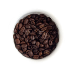 Fresh Roasted Coffee close-up of dark Sumatra beans highlighting oily sheen