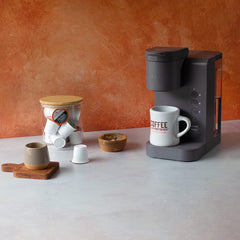 Fresh Roasted Coffee brewed cup poured from pod showing rich color and smooth finish