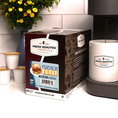 Fresh Roasted Coffee opened pod revealing grounds and compostable filter for easy disposal