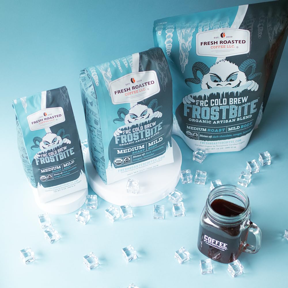 Fresh Roasted Coffee pouring brewed concentrate into glass, illustrating smooth low-acid cup