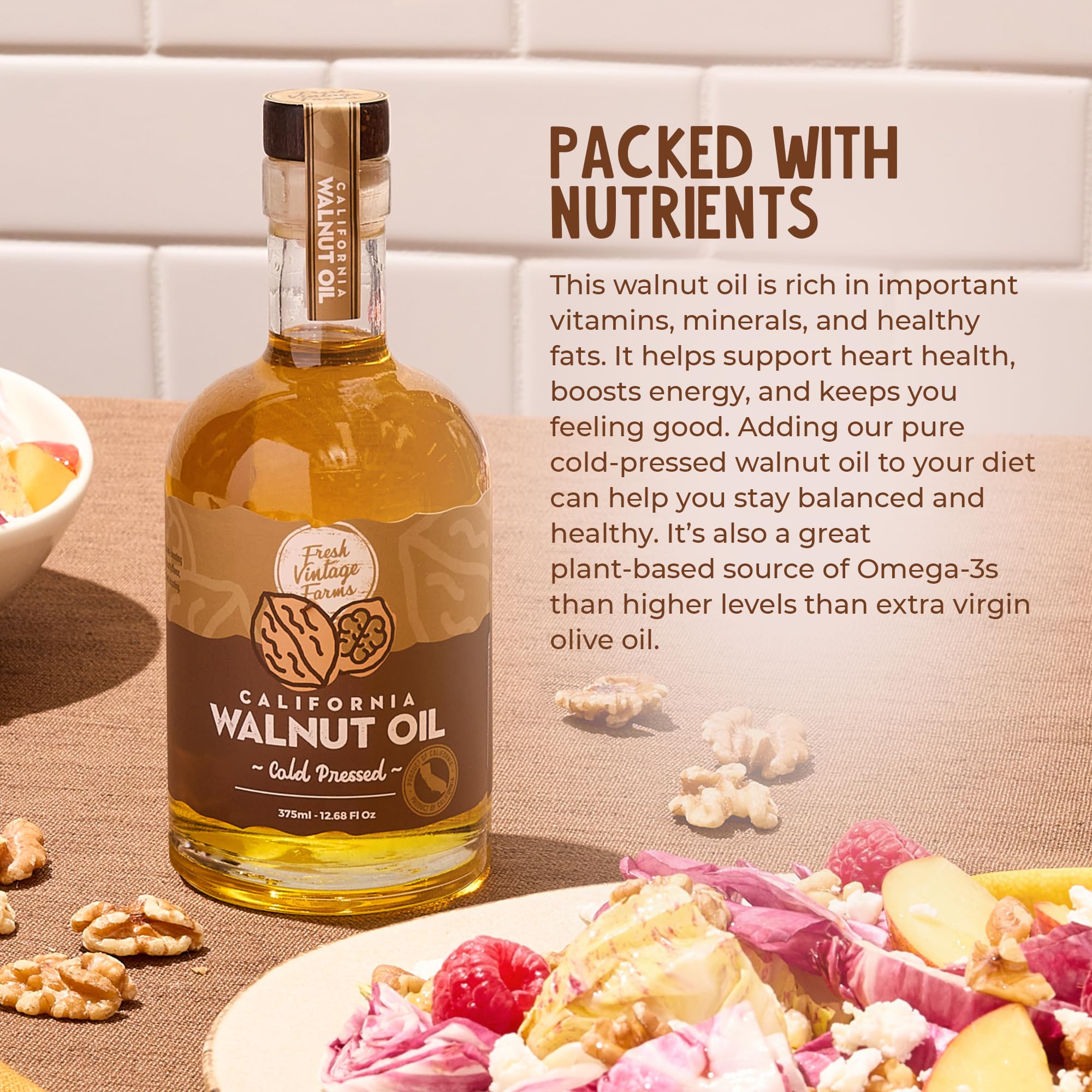 Fresh Vintage Farms walnut oil pouring from bottle, demonstrating smooth texture and finishing use