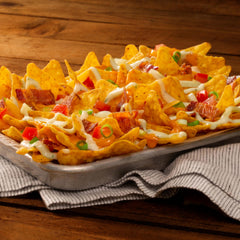 Frito‑Lay single pack held in hand for portable snack convenience