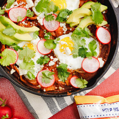 Fritos bean dip portioned in bowl during kitchen prep, quick appetizer
