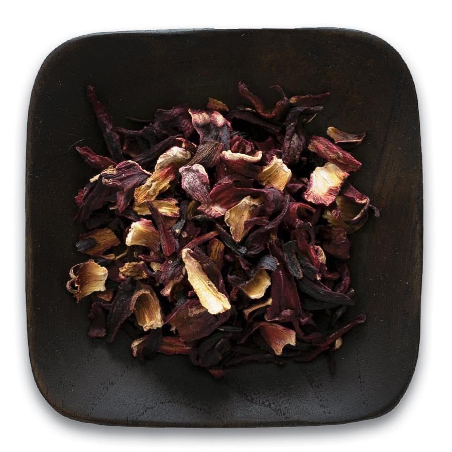 Frontier Co-op pitcher of brewed hibiscus tea showing vivid ruby color and serving idea