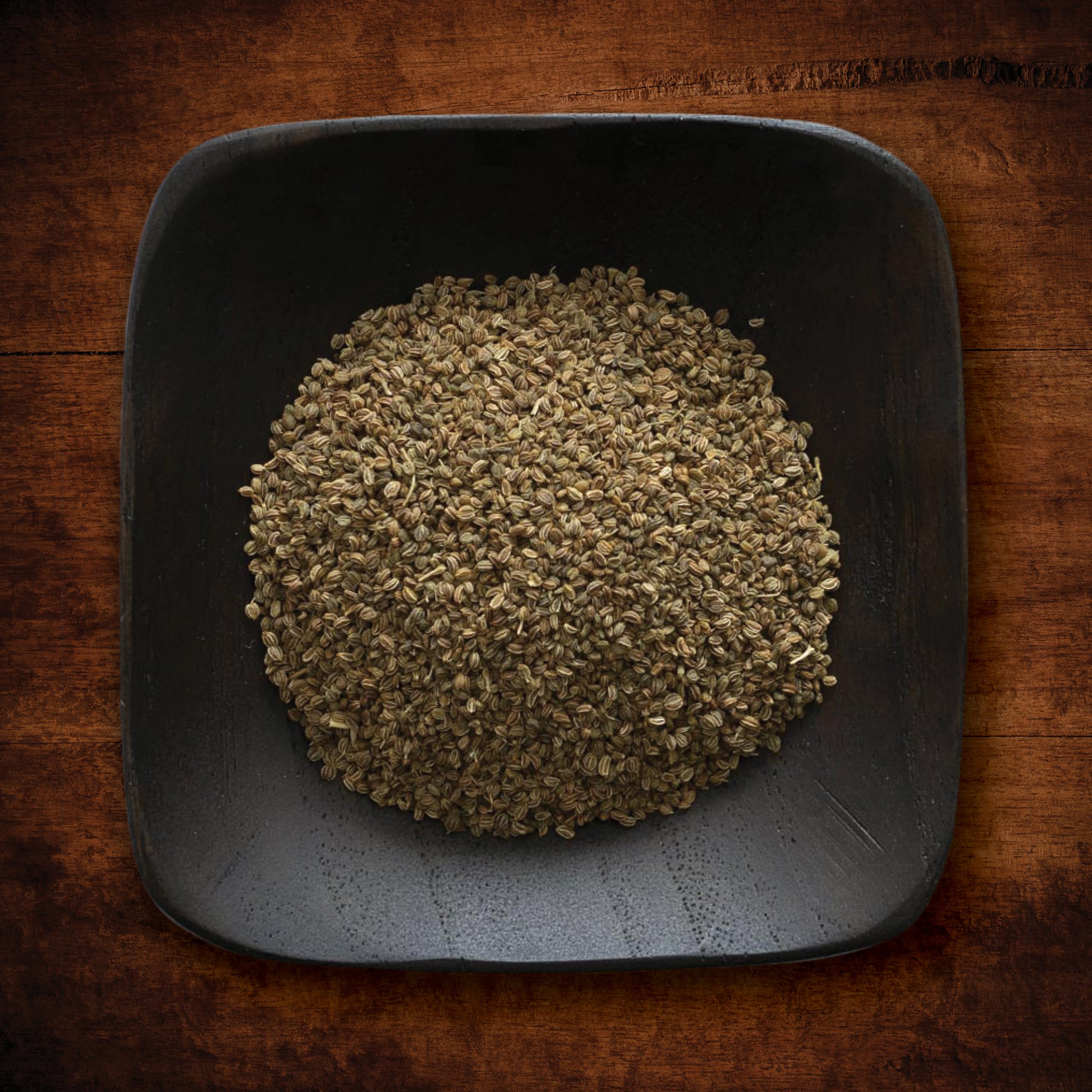 Bowl of salad sprinkled with Frontier Co-op celery seeds for crunchy, savory boost