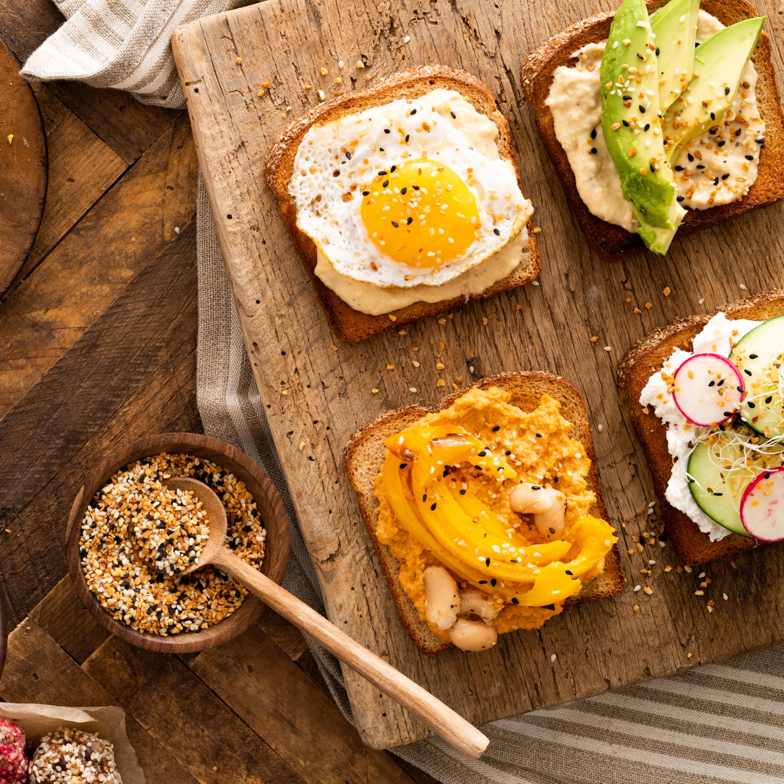 Frontier Co-op seasoning on avocado toast in kitchen scene shows versatility and flavor benefit