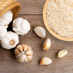 Measuring spoon of Frontier Co-op garlic powder ready to season, precise portion control
