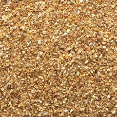 Frontier Co-op lemon peel granules sprinkled into batter illustrating easy citrus boost