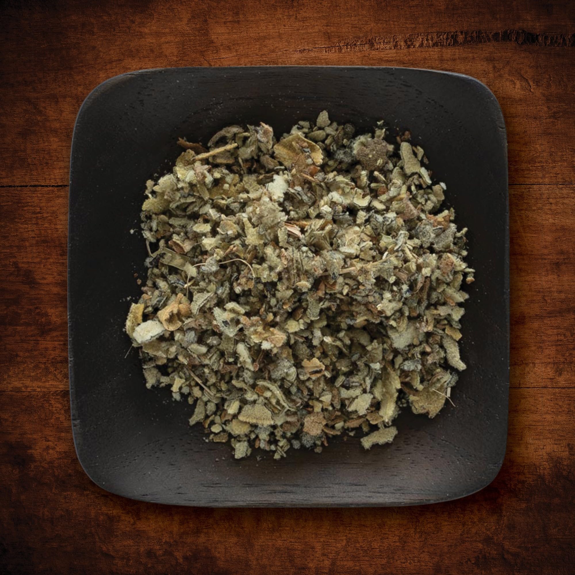 Measuring spoon and scale with Frontier Co-op mullein leaf indicating portion control