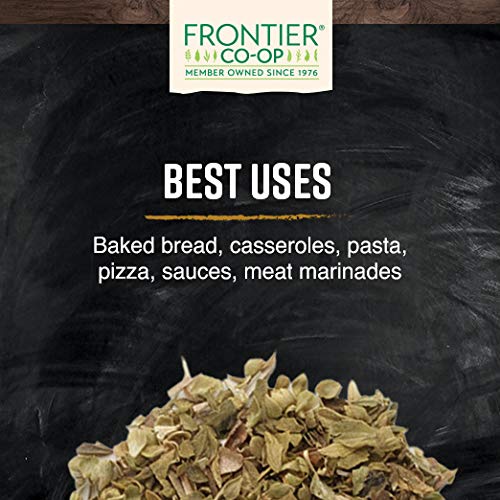 Frontier Co-op oregano in a bowl beside pizza illustrating ideal culinary use