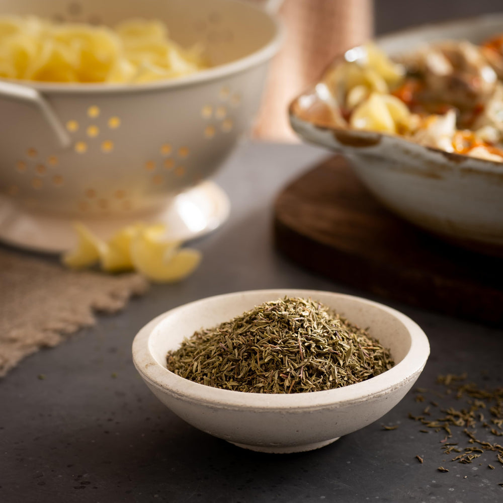 Frontier Co-op thyme in bowl next to measuring spoon for portioning benefit