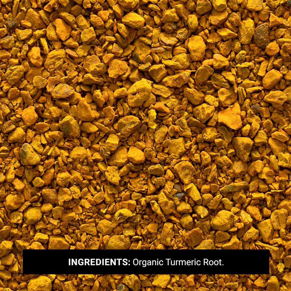 Frontier Co-op turmeric steeping in tea mug demonstrating vibrant color and warm infusion