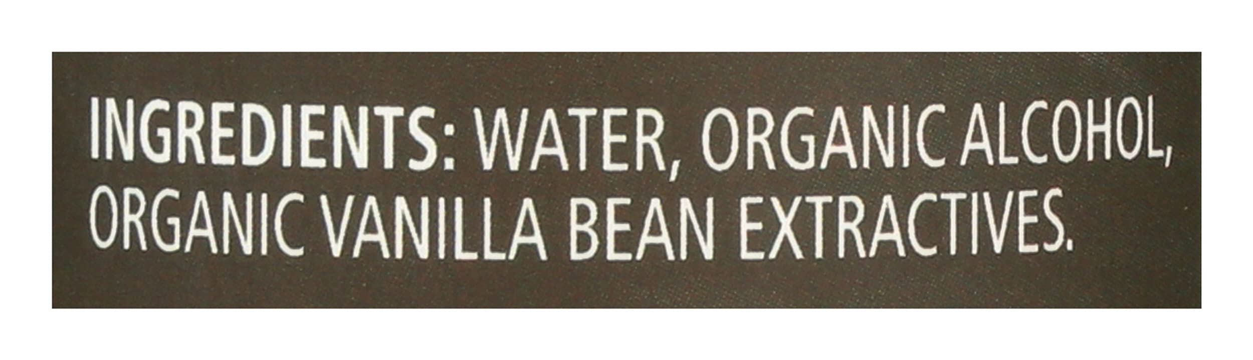 Vanilla being poured from Frontier Co-op into measuring spoon for precise flavor