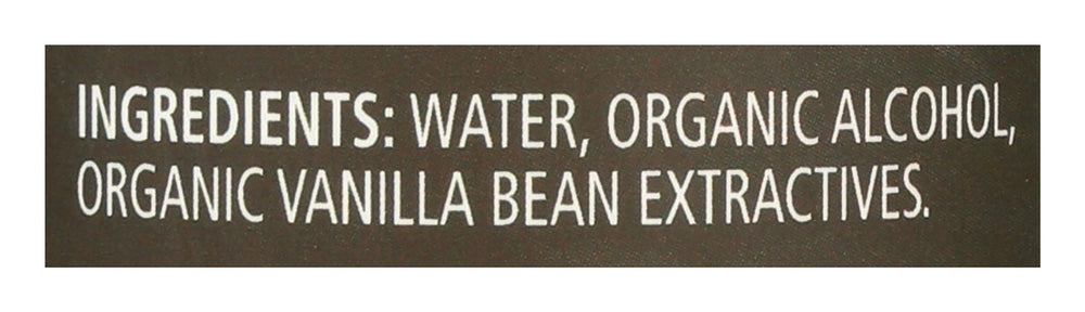 Vanilla being poured from Frontier Co-op into measuring spoon for precise flavor