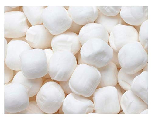 Fruidles buttermints arranged in a bowl on a candy table, ready for guests to enjoy