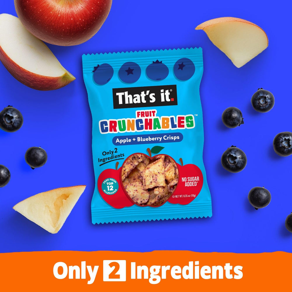 Hand holding Fruit Crunchables pouch to show scale and portability for on-the-go brand convenience