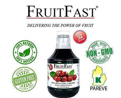 FruitFast bottle next to fresh cherries showing size and natural ingredient emphasis