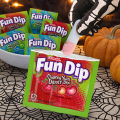 Array of Fun Dip pouches displaying Cherry Yum and Razz Apple options
