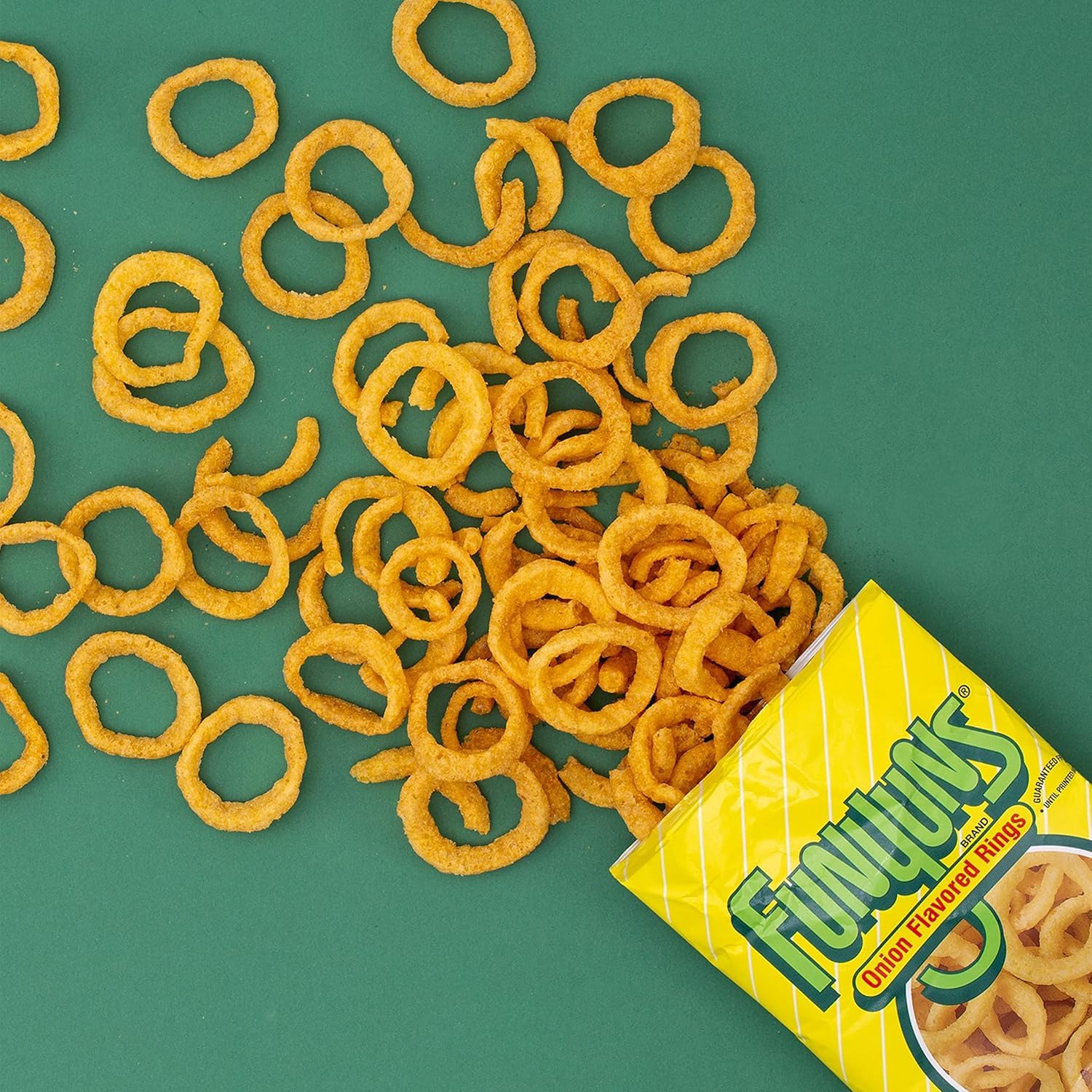 Hand holding single-serve Funyuns 0.75 oz bag to show portable size and convenience