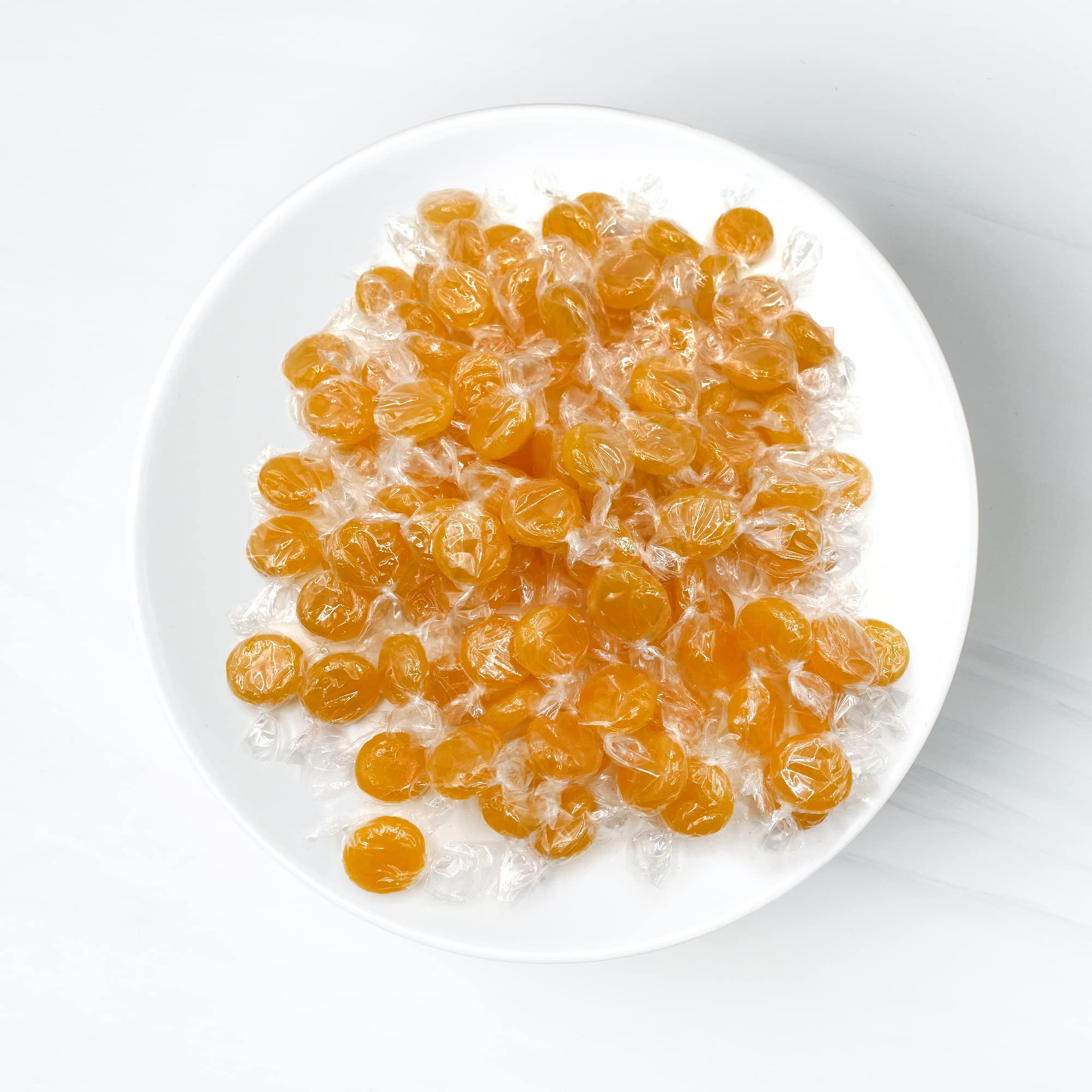 Fusion Sweets unwrapped disc close-up showing candy sheen and flavor clarity