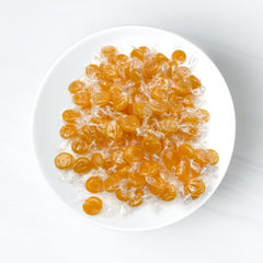 Fusion Sweets unwrapped disc close-up showing candy sheen and flavor clarity