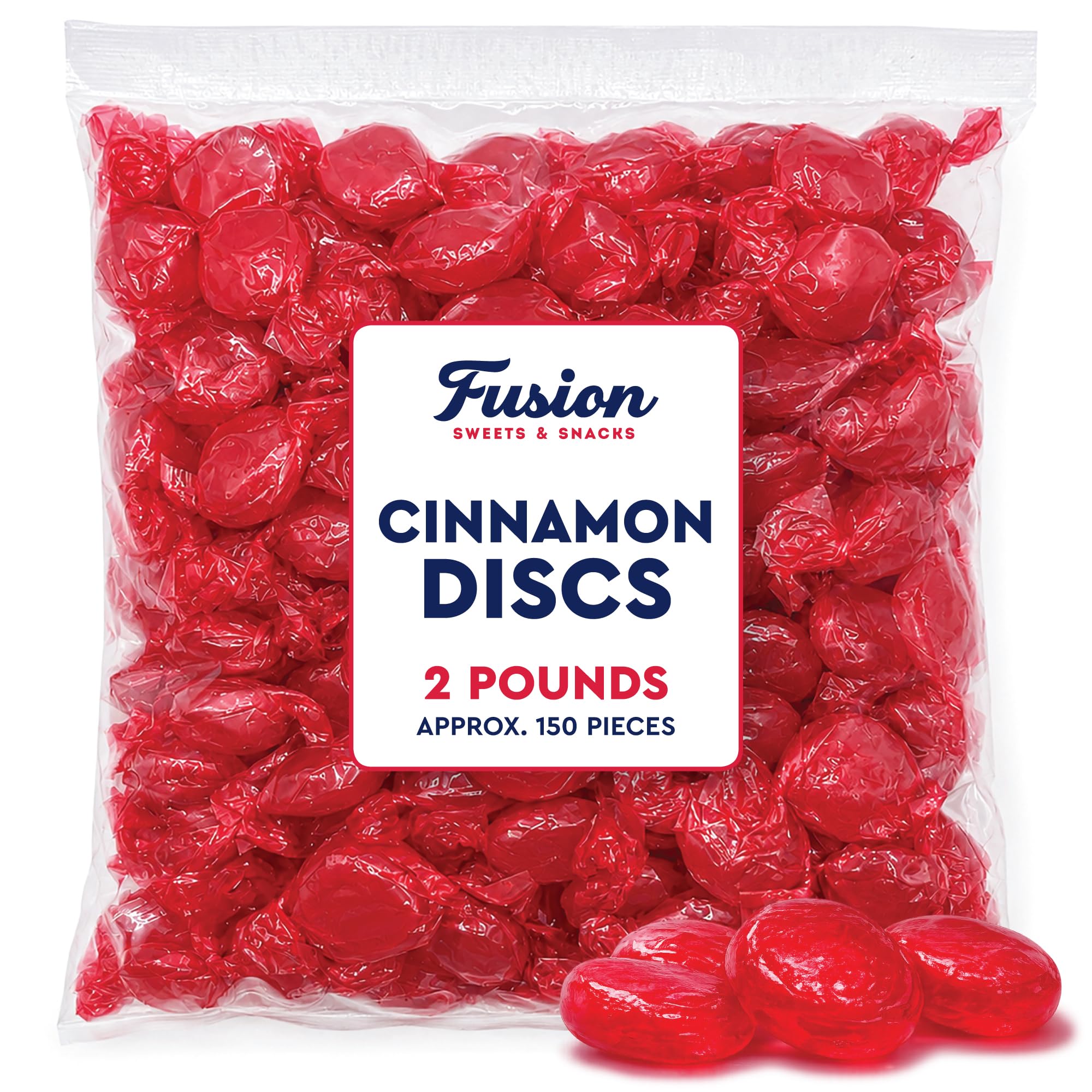 Fusion Sweets scattered cinnamon discs on white surface showing bold color and quantity