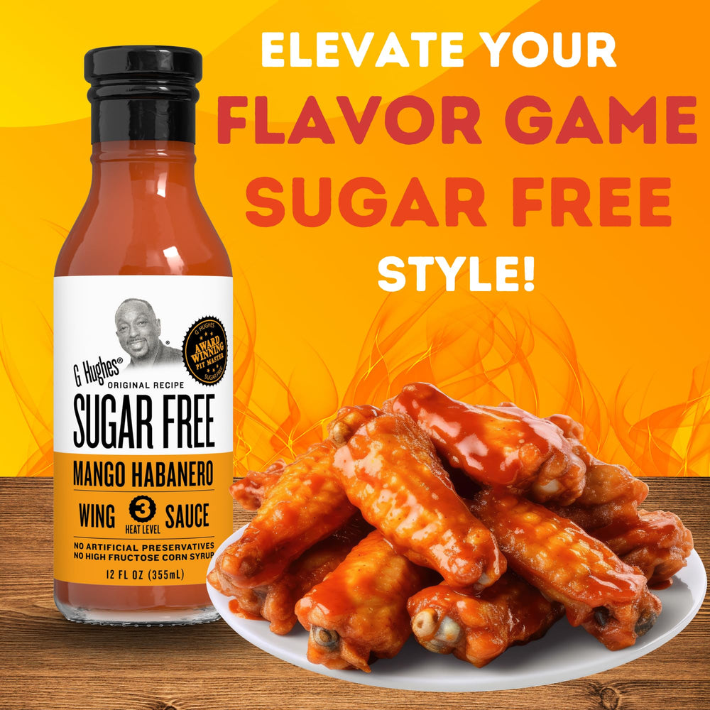 Close-up texture of G Hughes mango habanero sauce highlighting glossy glaze and fruit-pepper specks for rich coating