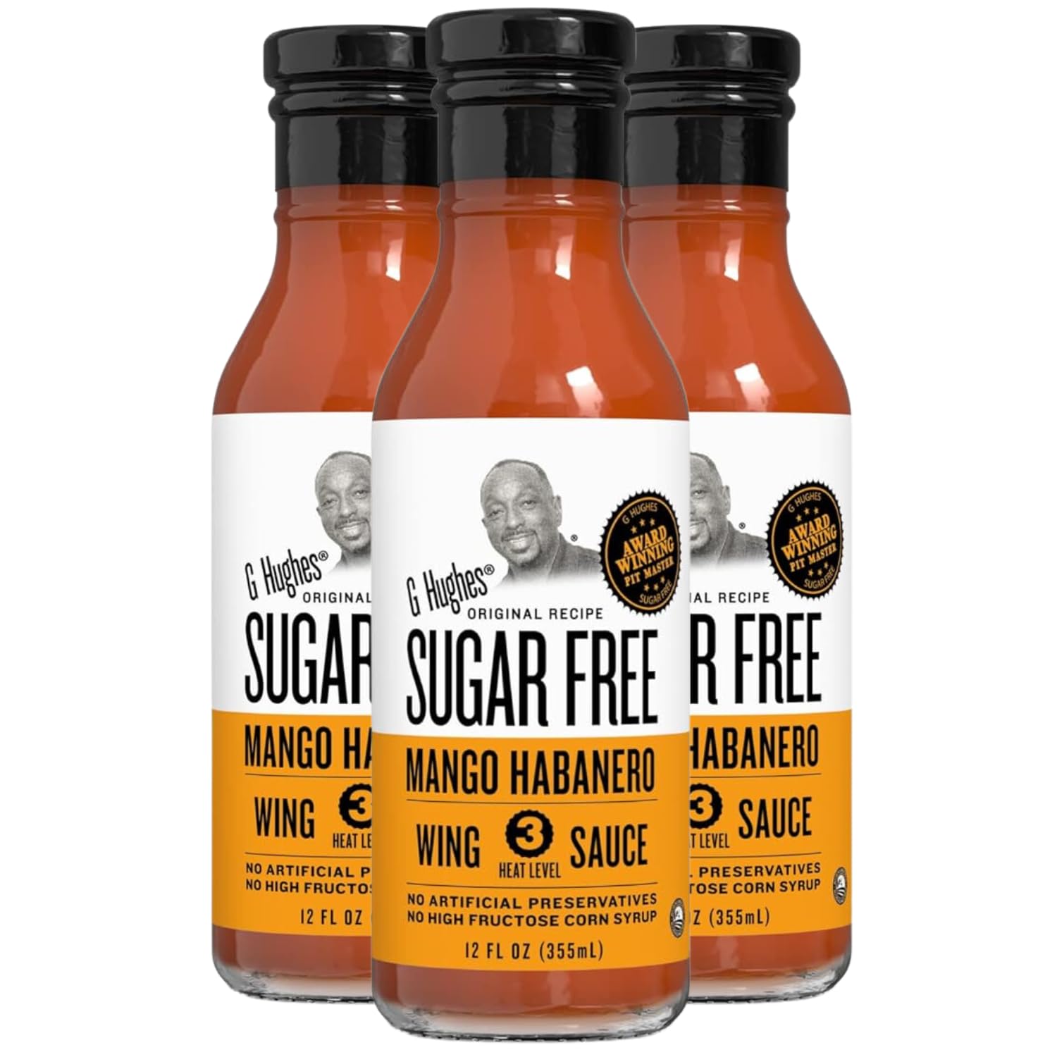 G Hughes front packaging showing three 12 oz bottles and bold mango habanero label for pantry convenience