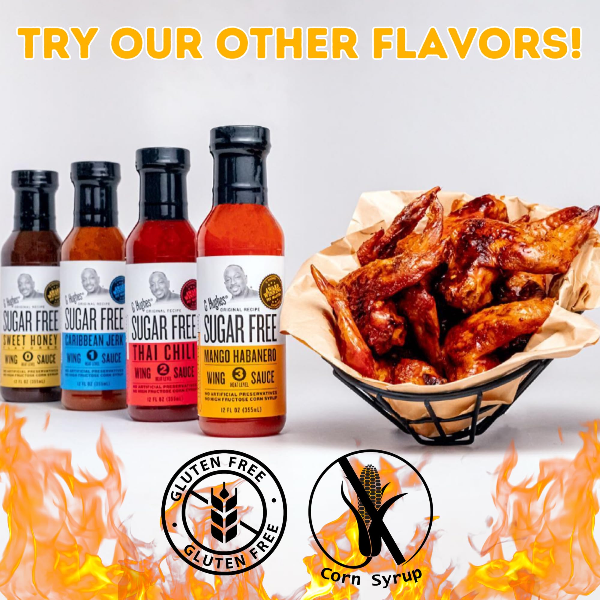 Lifestyle shot of G Hughes Mango Habanero sauce on a table with grilled foods to show serving inspiration