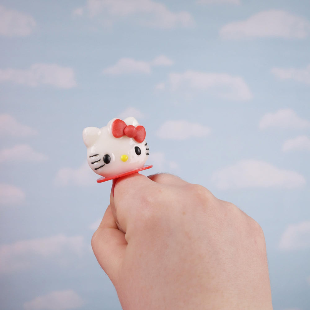 Galerie Hello Kitty ring worn on finger to show scale and fun accessory benefit