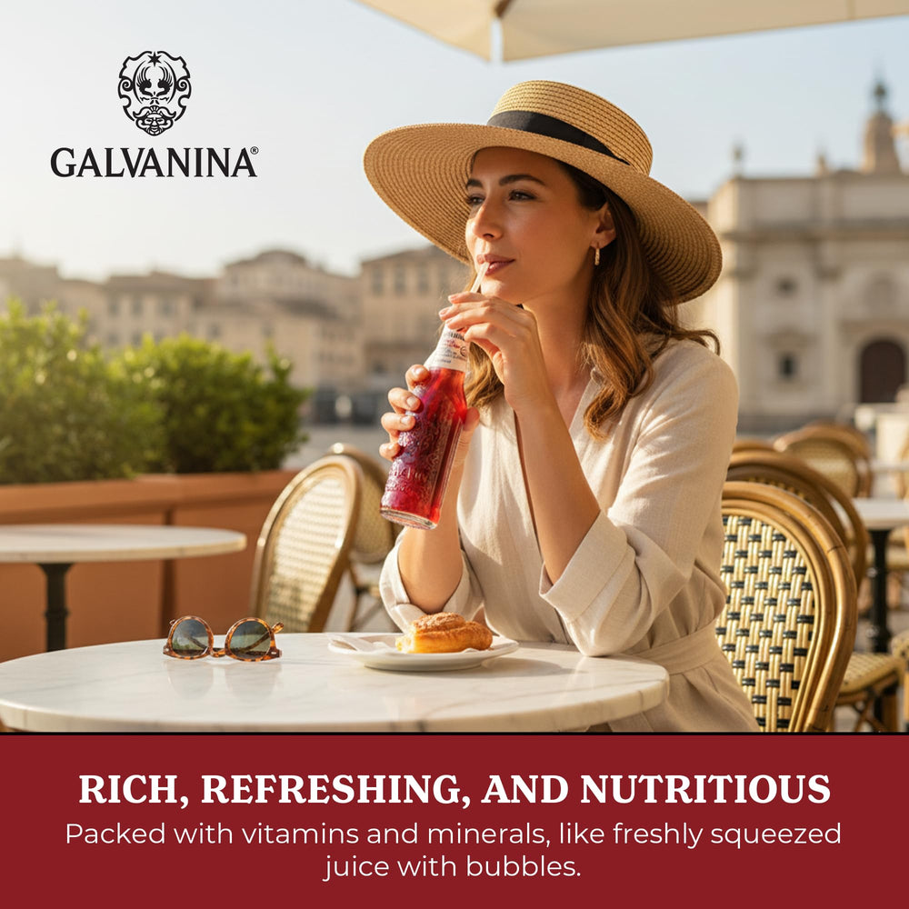 Sicilian blood oranges beside a Galvanina bottle showing authentic fruit sourcing