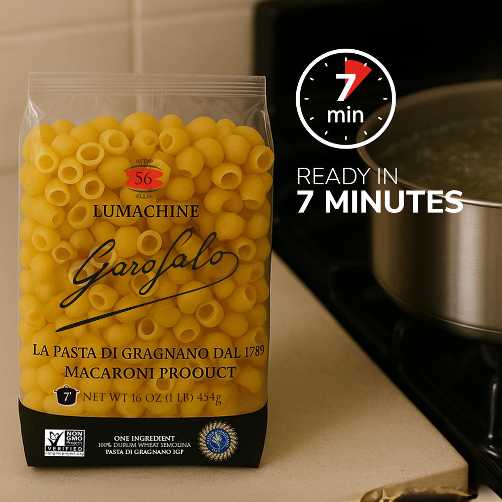 Hand holding Garofalo Lumachine dry pasta, shows single-ingredient durum wheat semolina