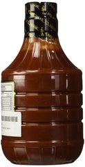Gates plated ribs with bottle nearby demonstrating rich finish and serving suggestion