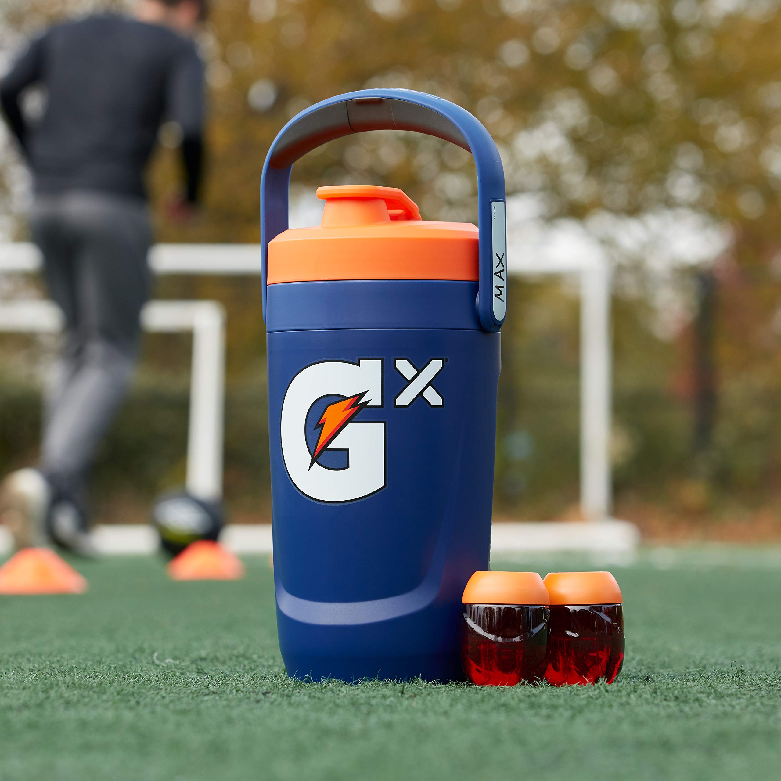 Gatorade Gx lifestyle field setting showing athlete-ready jug on soccer sideline