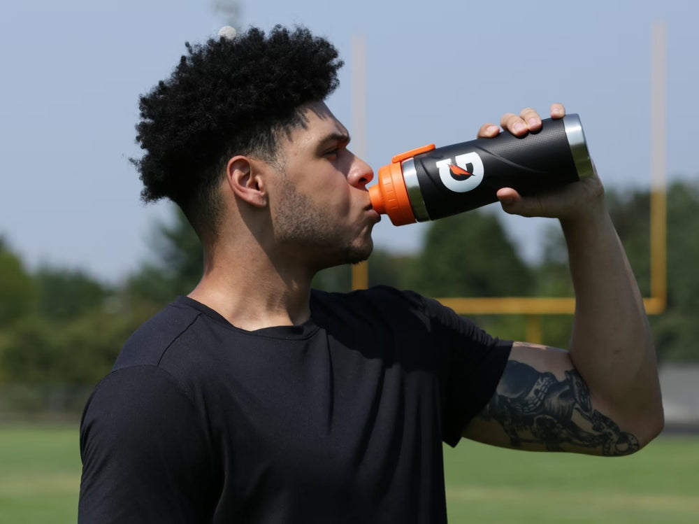 Gatorade poured into jug Riptide Rush showing large-batch serving convenience