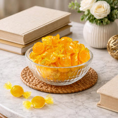 GEEOOLLAH candies in a glass jar on an event table adding visual appeal and easy access