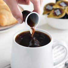 Generic espresso single bottle close-up showing rich espresso color and label clarity