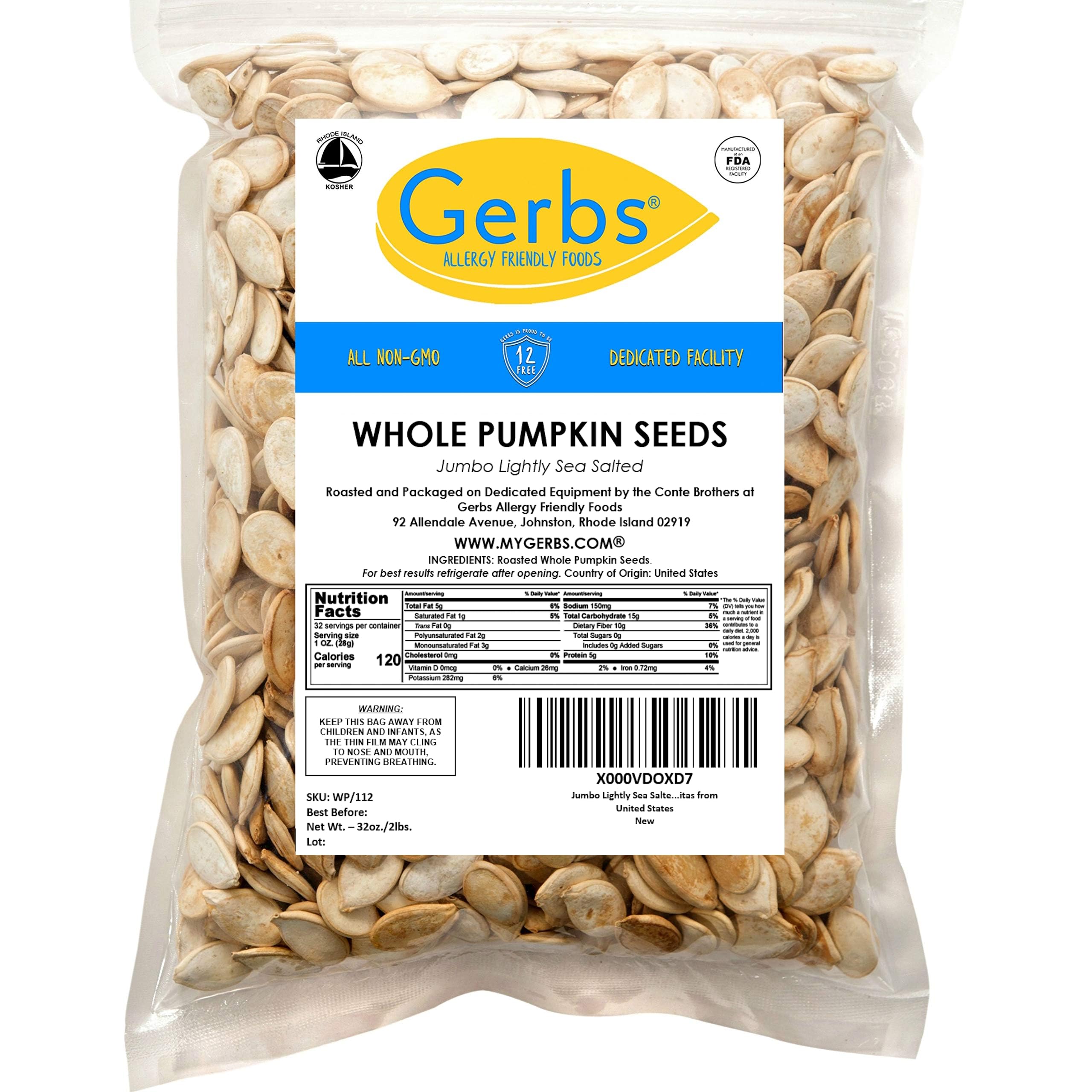 GERBS hand holding jumbo in-shell pumpkin seeds showing size