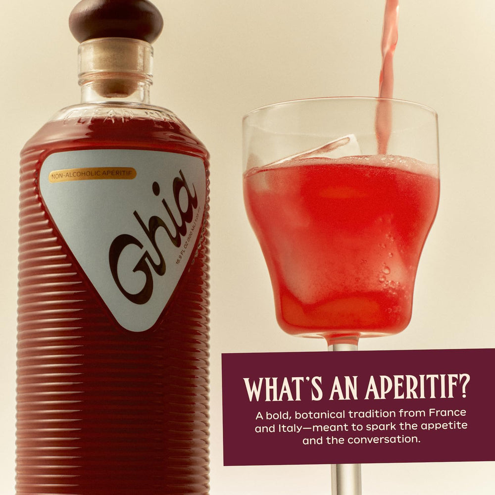 Pouring Ghia concentrate into a glass demonstrating texture and vibrant color