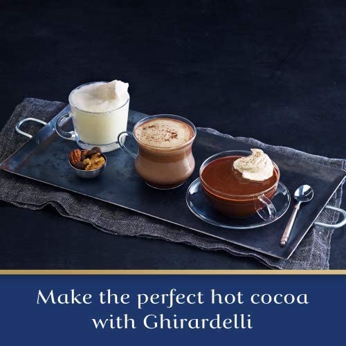Ghirardelli hot cocoa in a frothed mug demonstrating creamy, indulgent result