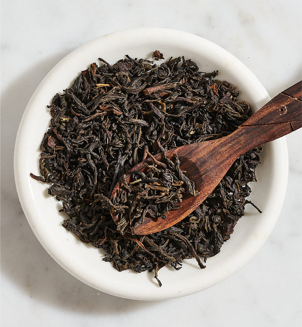 Ghograjan Tea Estate brewed cup with rich color illustrating strong full-bodied taste