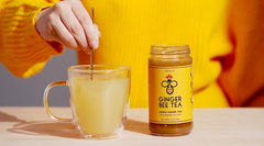 Ginger Bee concentrate texture spoonful, shows thick honey-ginger consistency