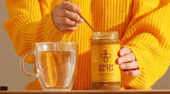 Ginger Bee jar close-up label, emphasizes real honey ingredient transparency