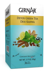 GIRNAR loose tea contents showing green leaves and spice pieces for aroma