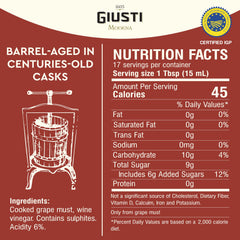 Giusti balsamic pouring thick texture highlighting glossy viscosity and depth