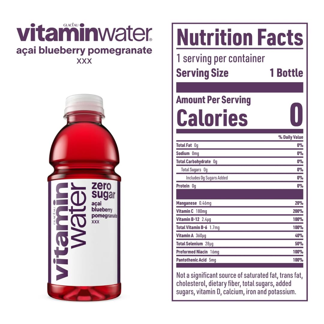 Hand holding Glacéau Vitaminwater bottle demonstrating portable convenience