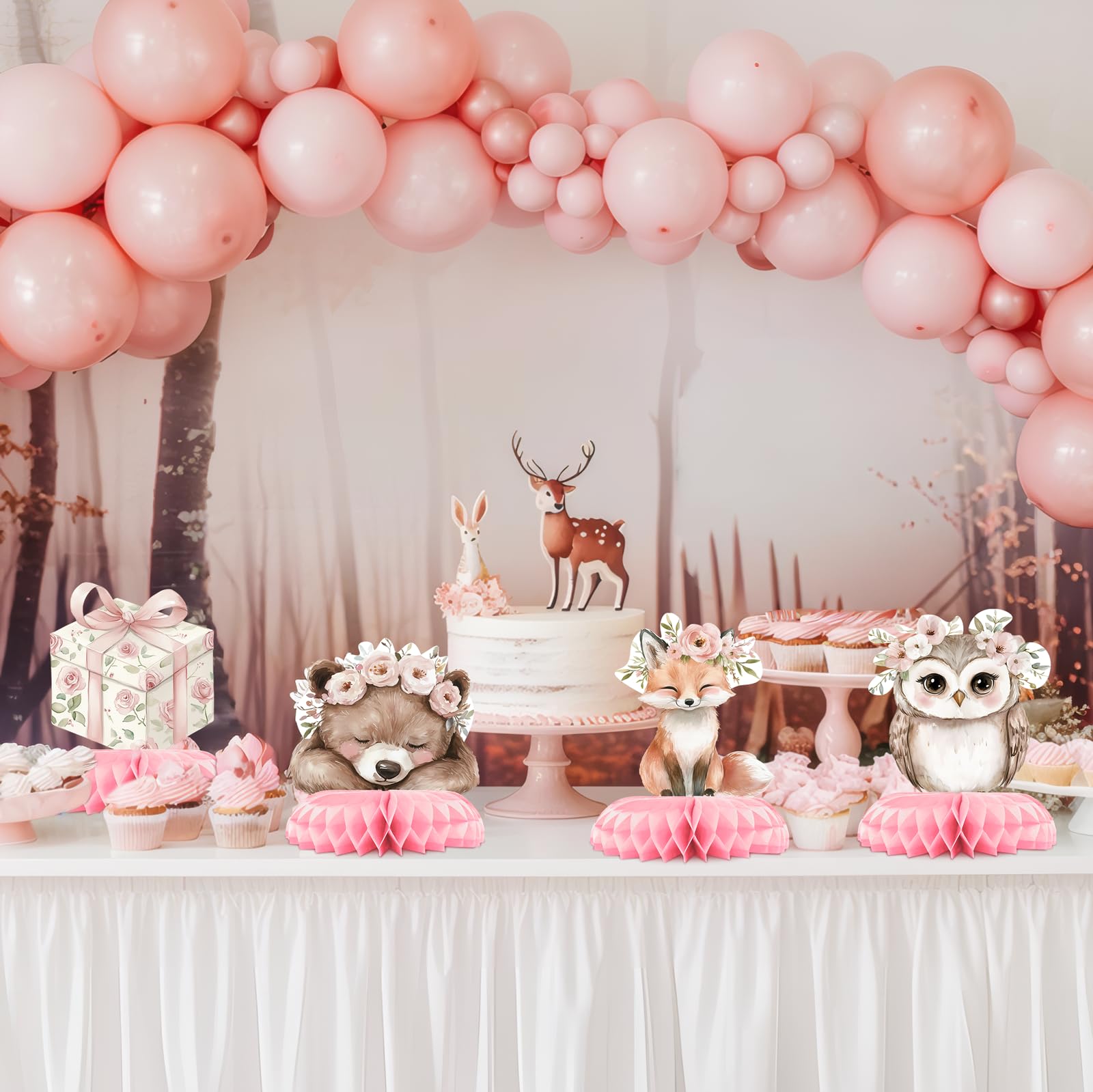Glezo arranged on a dessert table creating a cohesive woodland scene for a girl baby shower