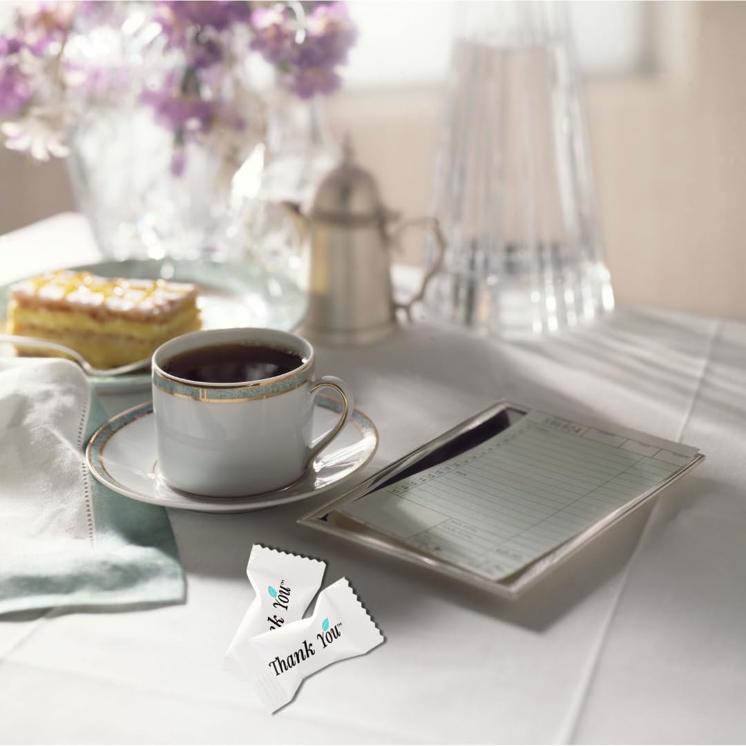 GLOBAL BASICS single individually wrapped mint displaying thank you message and hygiene benefit