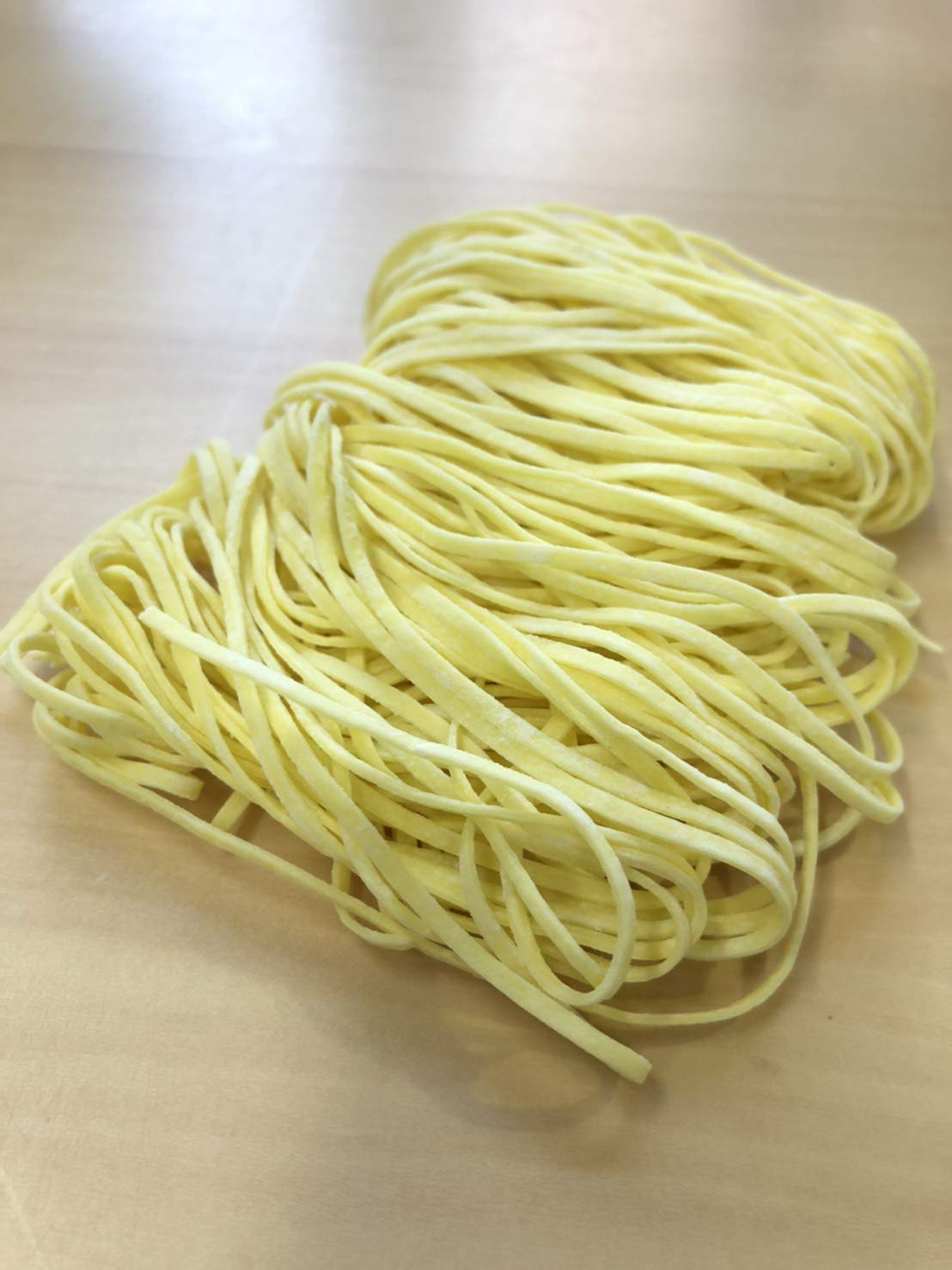 Gluten Free Meister noodle pack held in hand to show portion size