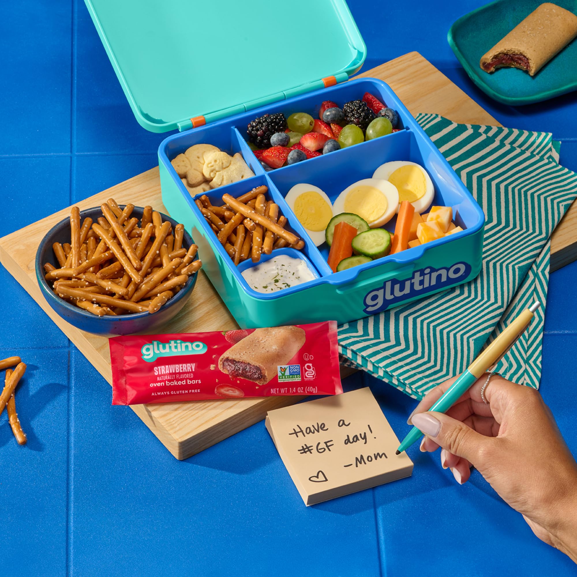Glutino bar in hand for scale and on-the-go convenience
